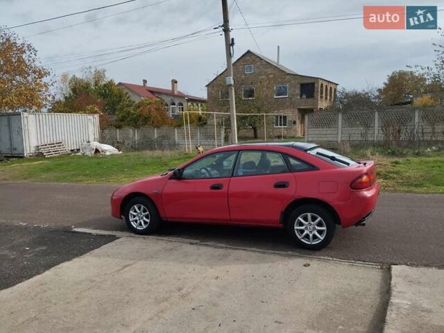 Красный Мазда 323, объемом двигателя 1.5 л и пробегом 258 тыс. км за 1600 $, фото 3 на Automoto.ua