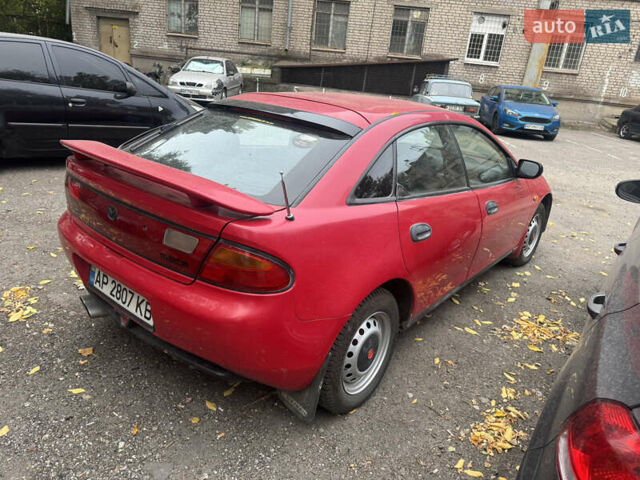 Красный Мазда 323, объемом двигателя 1.5 л и пробегом 160 тыс. км за 1500 $, фото 2 на Automoto.ua