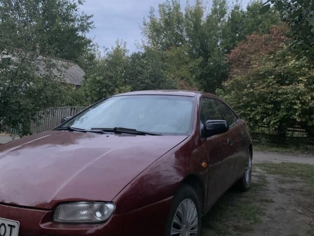 Красный Мазда 323, объемом двигателя 1.5 л и пробегом 3 тыс. км за 1700 $, фото 1 на Automoto.ua