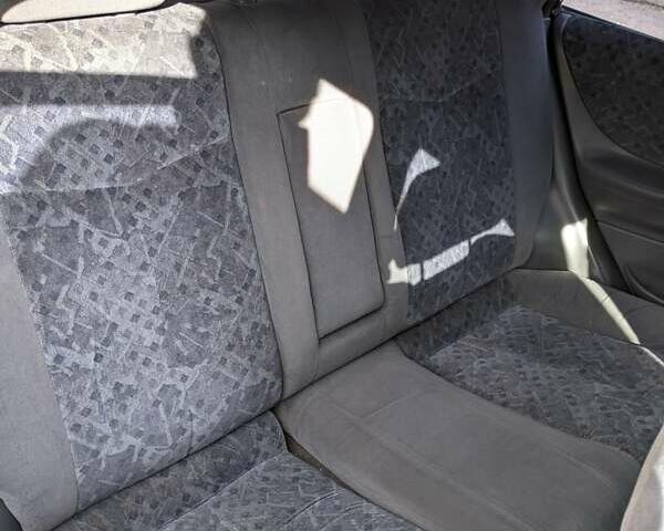 Красный Мазда 323, объемом двигателя 1.5 л и пробегом 487 тыс. км за 2250 $, фото 4 на Automoto.ua