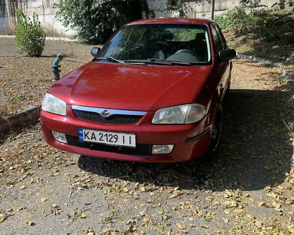 Красный Мазда 323, объемом двигателя 1.5 л и пробегом 412 тыс. км за 3200 $, фото 1 на Automoto.ua
