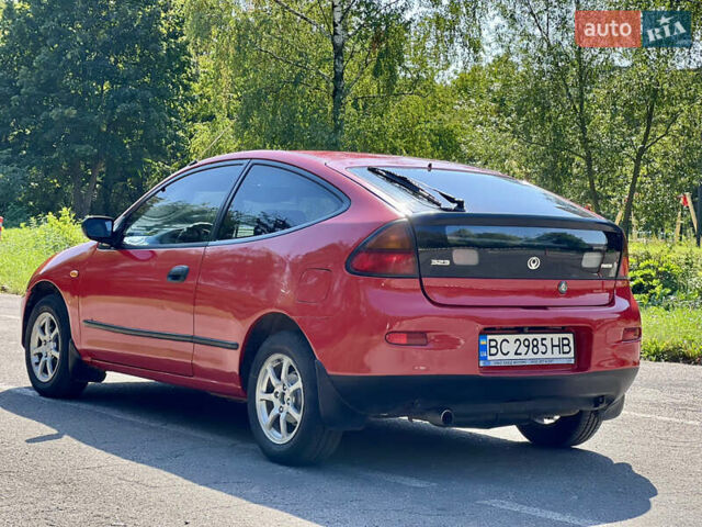 Червоний Мазда 323, об'ємом двигуна 1.5 л та пробігом 300 тис. км за 2199 $, фото 10 на Automoto.ua