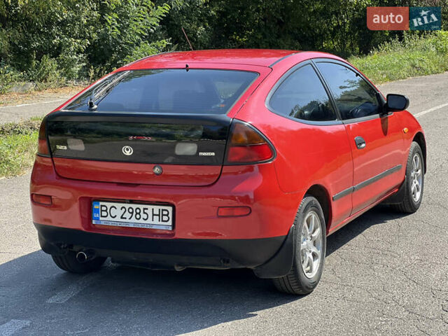 Червоний Мазда 323, об'ємом двигуна 1.5 л та пробігом 300 тис. км за 2299 $, фото 12 на Automoto.ua