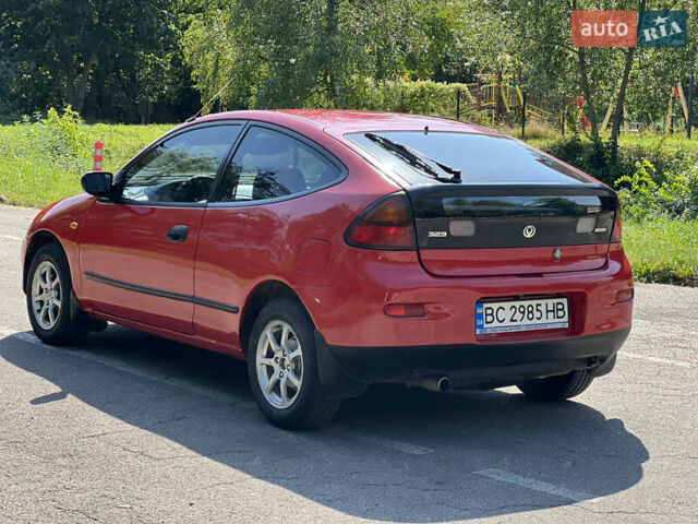 Червоний Мазда 323, об'ємом двигуна 1.5 л та пробігом 300 тис. км за 2299 $, фото 8 на Automoto.ua