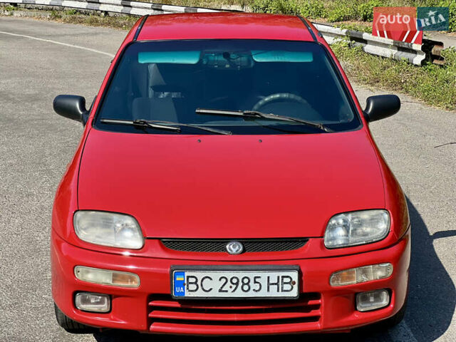 Красный Мазда 323, объемом двигателя 1.5 л и пробегом 300 тыс. км за 1999 $, фото 16 на Automoto.ua