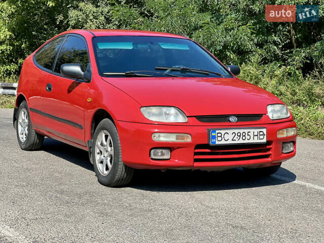 Красный Мазда 323, объемом двигателя 1.5 л и пробегом 300 тыс. км за 1999 $, фото 18 на Automoto.ua