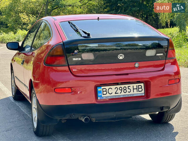 Красный Мазда 323, объемом двигателя 1.5 л и пробегом 300 тыс. км за 1999 $, фото 9 на Automoto.ua