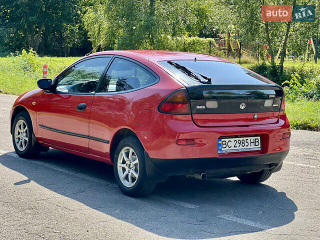 Червоний Мазда 323, об'ємом двигуна 1.5 л та пробігом 300 тис. км за 2199 $, фото 11 на Automoto.ua