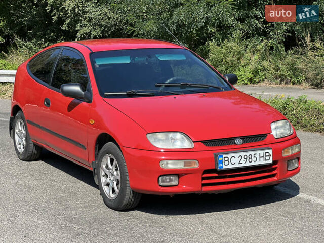 Червоний Мазда 323, об'ємом двигуна 1.5 л та пробігом 300 тис. км за 2299 $, фото 13 на Automoto.ua