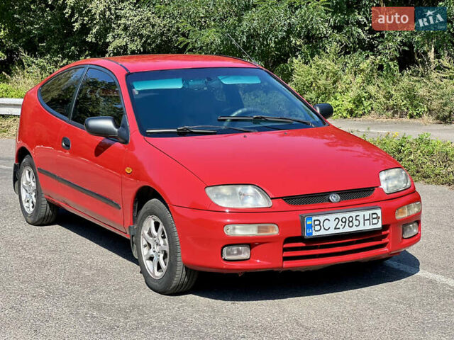 Красный Мазда 323, объемом двигателя 1.5 л и пробегом 300 тыс. км за 1999 $, фото 13 на Automoto.ua