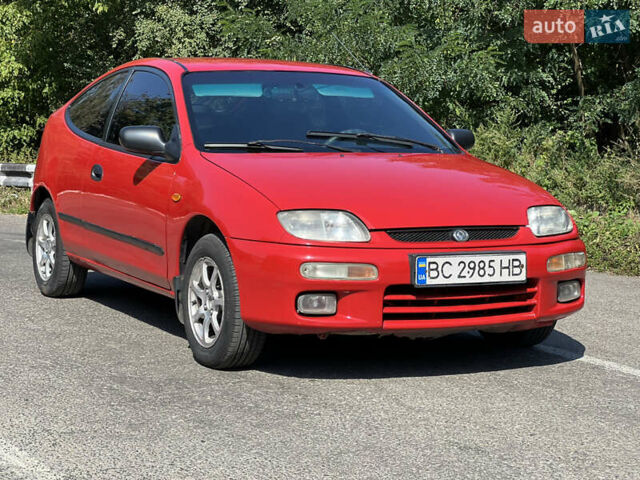 Червоний Мазда 323, об'ємом двигуна 1.5 л та пробігом 300 тис. км за 2299 $, фото 14 на Automoto.ua