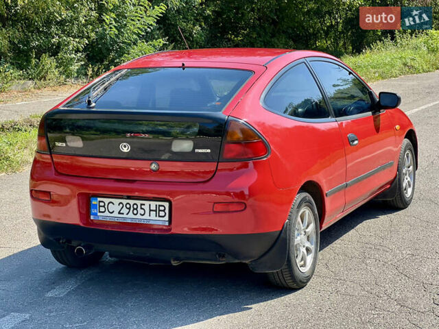 Красный Мазда 323, объемом двигателя 1.5 л и пробегом 300 тыс. км за 1999 $, фото 12 на Automoto.ua