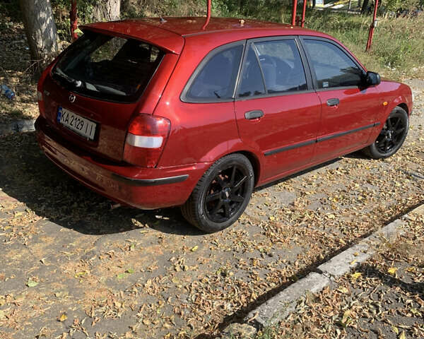 Красный Мазда 323, объемом двигателя 1.5 л и пробегом 412 тыс. км за 3200 $, фото 2 на Automoto.ua