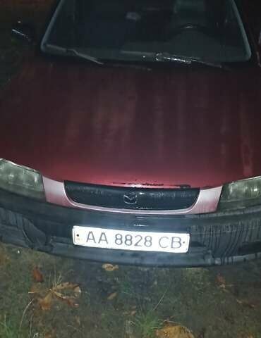 Красный Мазда 323, объемом двигателя 1.3 л и пробегом 250 тыс. км за 2500 $, фото 4 на Automoto.ua