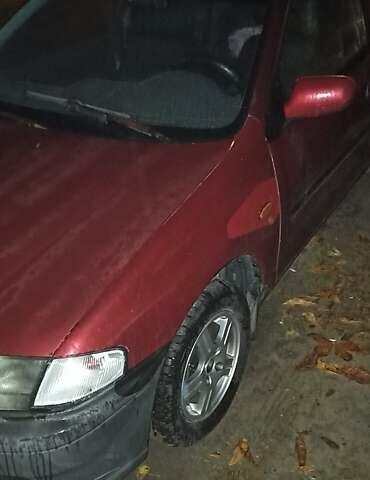 Красный Мазда 323, объемом двигателя 1.3 л и пробегом 250 тыс. км за 2500 $, фото 9 на Automoto.ua