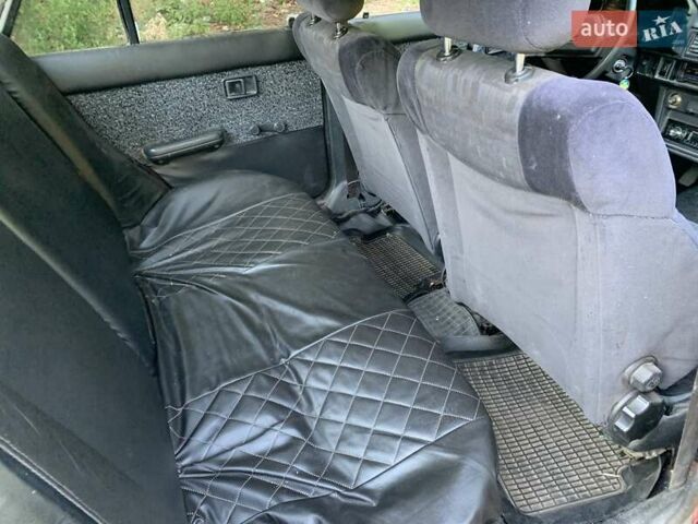 Червоний Мазда 323, об'ємом двигуна 1.3 л та пробігом 450 тис. км за 950 $, фото 12 на Automoto.ua