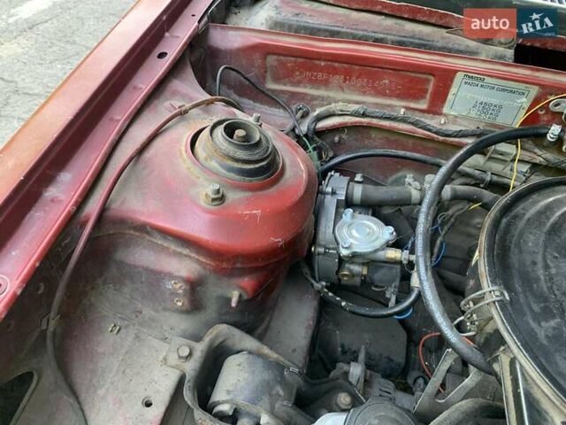 Червоний Мазда 323, об'ємом двигуна 1.3 л та пробігом 450 тис. км за 950 $, фото 16 на Automoto.ua