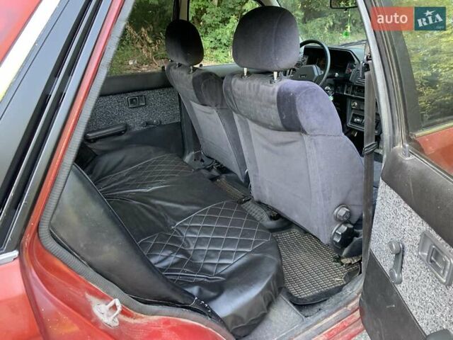 Червоний Мазда 323, об'ємом двигуна 1.3 л та пробігом 450 тис. км за 950 $, фото 11 на Automoto.ua