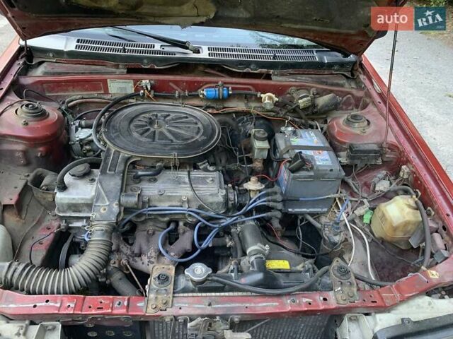 Червоний Мазда 323, об'ємом двигуна 1.3 л та пробігом 450 тис. км за 950 $, фото 15 на Automoto.ua