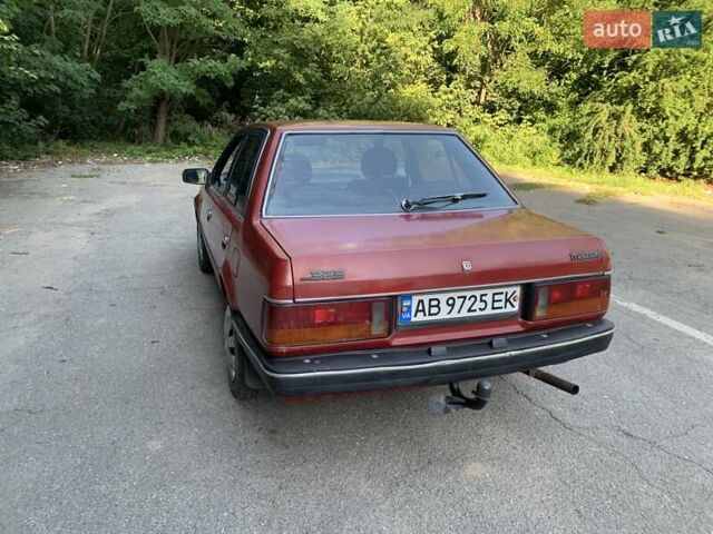 Червоний Мазда 323, об'ємом двигуна 1.3 л та пробігом 450 тис. км за 950 $, фото 3 на Automoto.ua