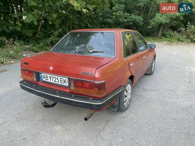 Червоний Мазда 323, об'ємом двигуна 1.3 л та пробігом 450 тис. км за 950 $, фото 4 на Automoto.ua