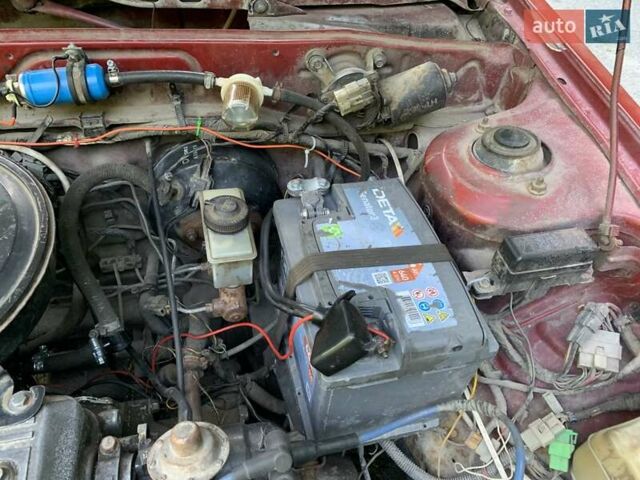 Червоний Мазда 323, об'ємом двигуна 1.3 л та пробігом 450 тис. км за 950 $, фото 17 на Automoto.ua