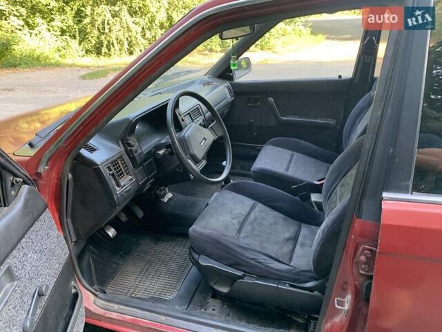 Червоний Мазда 323, об'ємом двигуна 1.3 л та пробігом 450 тис. км за 950 $, фото 14 на Automoto.ua