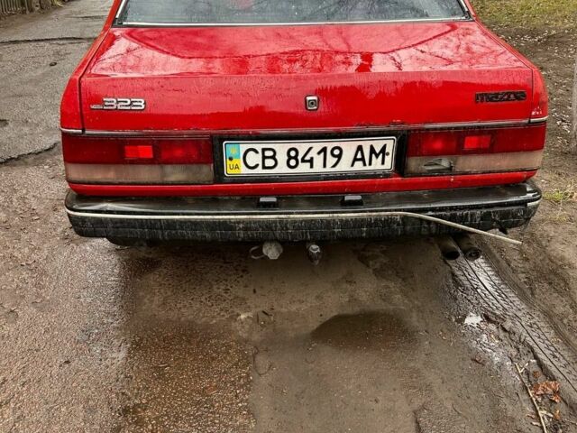 Мазда 323 1988 у Прилуках на Automoto.ua Червоний Мазда 323, об'ємом двигуна 2 л та пробігом 80 тис. км за 991 $, фото 4 на Automoto.ua