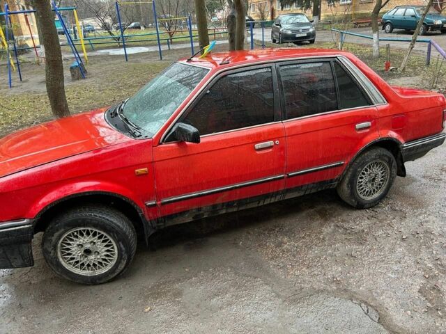 Мазда 323 1988 у Прилуках на Automoto.ua Червоний Мазда 323, об'ємом двигуна 2 л та пробігом 80 тис. км за 991 $, фото 5 на Automoto.ua