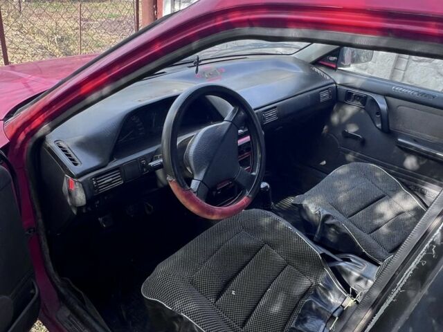 Червоний Мазда 323, об'ємом двигуна 1.4 л та пробігом 300 тис. км за 785 $, фото 5 на Automoto.ua