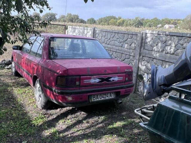 Червоний Мазда 323, об'ємом двигуна 1.4 л та пробігом 300 тис. км за 785 $, фото 1 на Automoto.ua