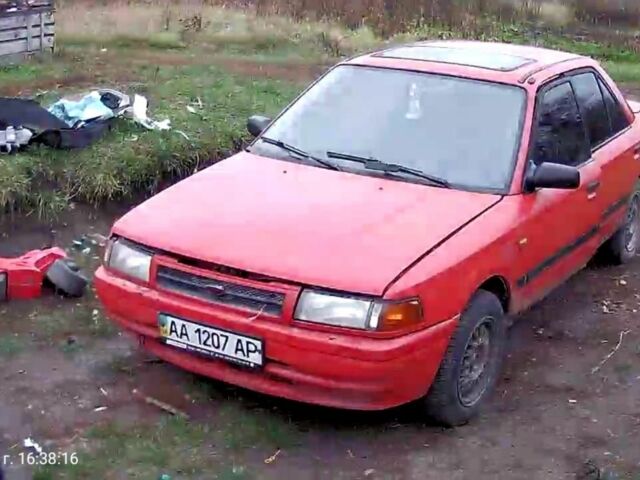 Красный Мазда 323, объемом двигателя 2 л и пробегом 4 тыс. км за 904 $, фото 2 на Automoto.ua