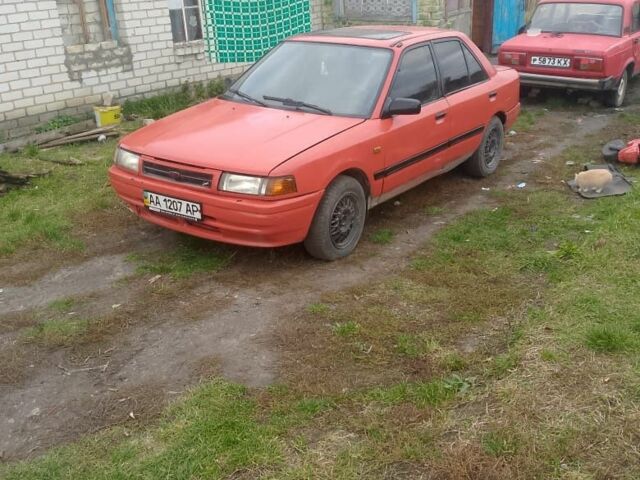 Красный Мазда 323, объемом двигателя 2 л и пробегом 4 тыс. км за 904 $, фото 1 на Automoto.ua