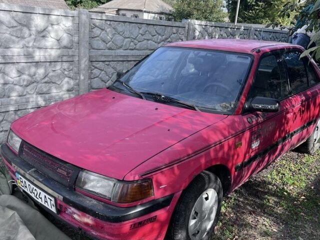 Червоний Мазда 323, об'ємом двигуна 1.4 л та пробігом 300 тис. км за 785 $, фото 4 на Automoto.ua