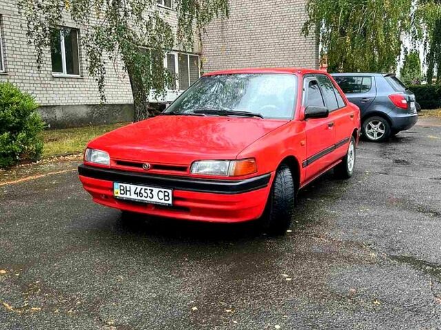 Красный Мазда 323, объемом двигателя 1.6 л и пробегом 240 тыс. км за 1200 $, фото 2 на Automoto.ua