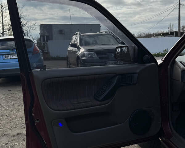 Красный Мазда 323, объемом двигателя 1.6 л и пробегом 350 тыс. км за 1200 $, фото 14 на Automoto.ua