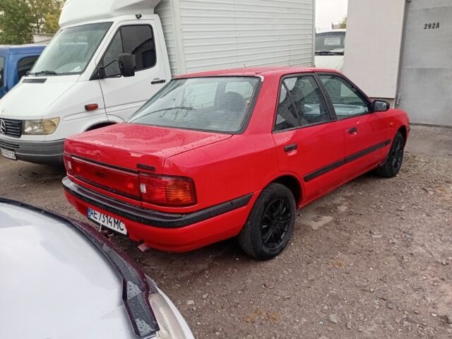 Красный Мазда 323, объемом двигателя 1.6 л и пробегом 260 тыс. км за 1000 $, фото 3 на Automoto.ua