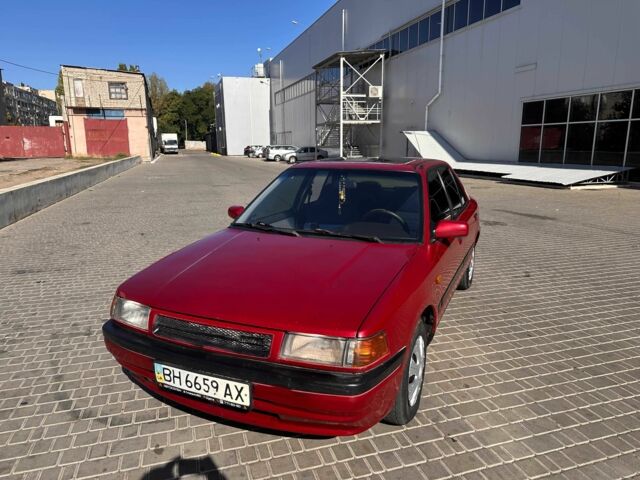 Червоний Мазда 323, об'ємом двигуна 1.3 л та пробігом 200 тис. км за 1250 $, фото 5 на Automoto.ua