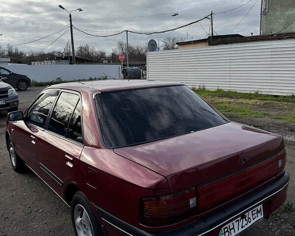Красный Мазда 323, объемом двигателя 1.6 л и пробегом 350 тыс. км за 1200 $, фото 4 на Automoto.ua