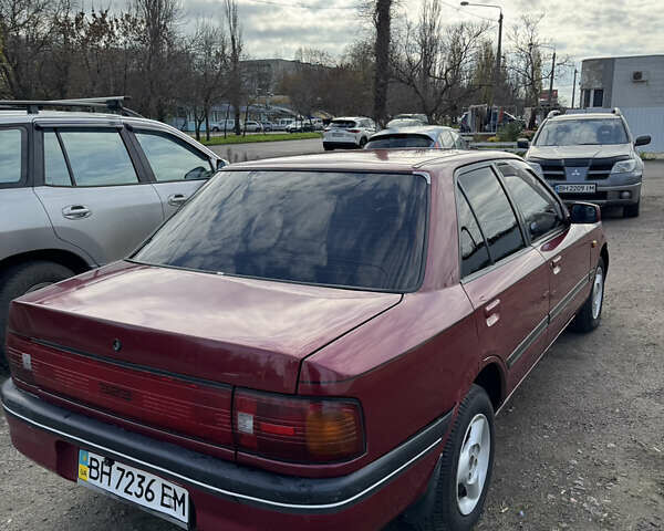 Красный Мазда 323, объемом двигателя 1.6 л и пробегом 350 тыс. км за 1200 $, фото 3 на Automoto.ua
