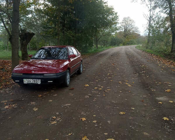 Красный Мазда 323, объемом двигателя 1.6 л и пробегом 429 тыс. км за 1900 $, фото 3 на Automoto.ua