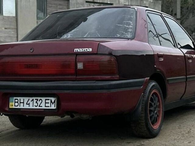 Червоний Мазда 323, об'ємом двигуна 1.6 л та пробігом 340 тис. км за 900 $, фото 2 на Automoto.ua