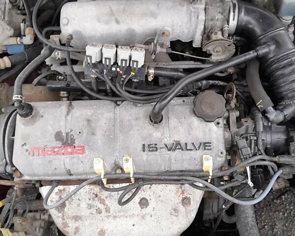 Червоний Мазда 323, об'ємом двигуна 1.49 л та пробігом 290 тис. км за 2800 $, фото 10 на Automoto.ua