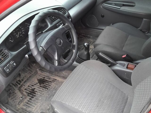 Червоний Мазда 323, об'ємом двигуна 1.5 л та пробігом 290 тис. км за 2800 $, фото 3 на Automoto.ua