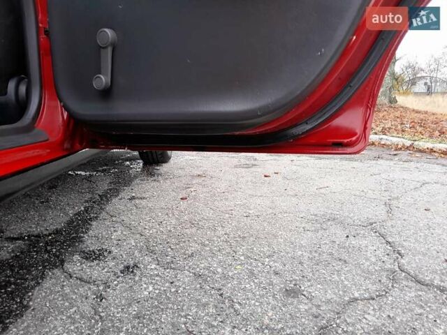 Червоний Мазда 323, об'ємом двигуна 1.49 л та пробігом 290 тис. км за 2800 $, фото 18 на Automoto.ua