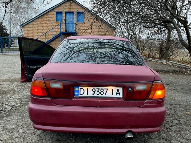 Красный Мазда 323, объемом двигателя 1.5 л и пробегом 0 тыс. км за 1600 $, фото 1 на Automoto.ua