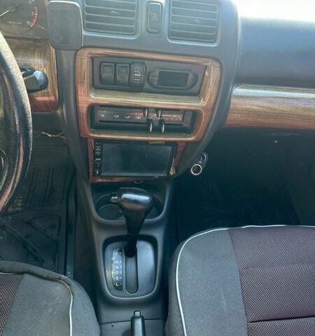 Красный Мазда 323, объемом двигателя 1.49 л и пробегом 282 тыс. км за 1400 $, фото 12 на Automoto.ua