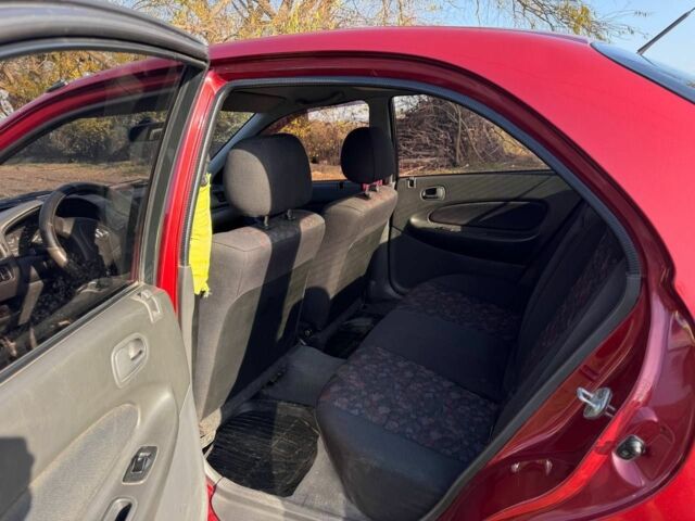 Червоний Мазда 323, об'ємом двигуна 1.8 л та пробігом 1 тис. км за 2450 $, фото 7 на Automoto.ua