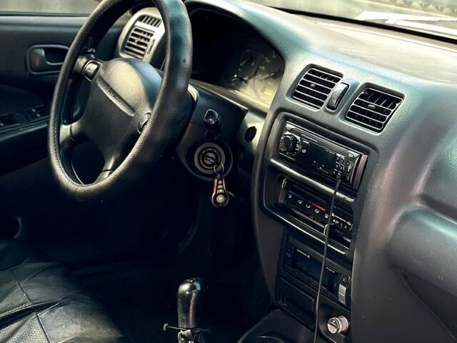 Красный Мазда 323, объемом двигателя 1.5 л и пробегом 0 тыс. км за 1600 $, фото 3 на Automoto.ua