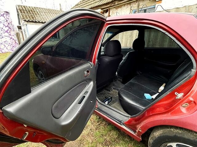 Красный Мазда 323, объемом двигателя 1.5 л и пробегом 0 тыс. км за 1600 $, фото 6 на Automoto.ua